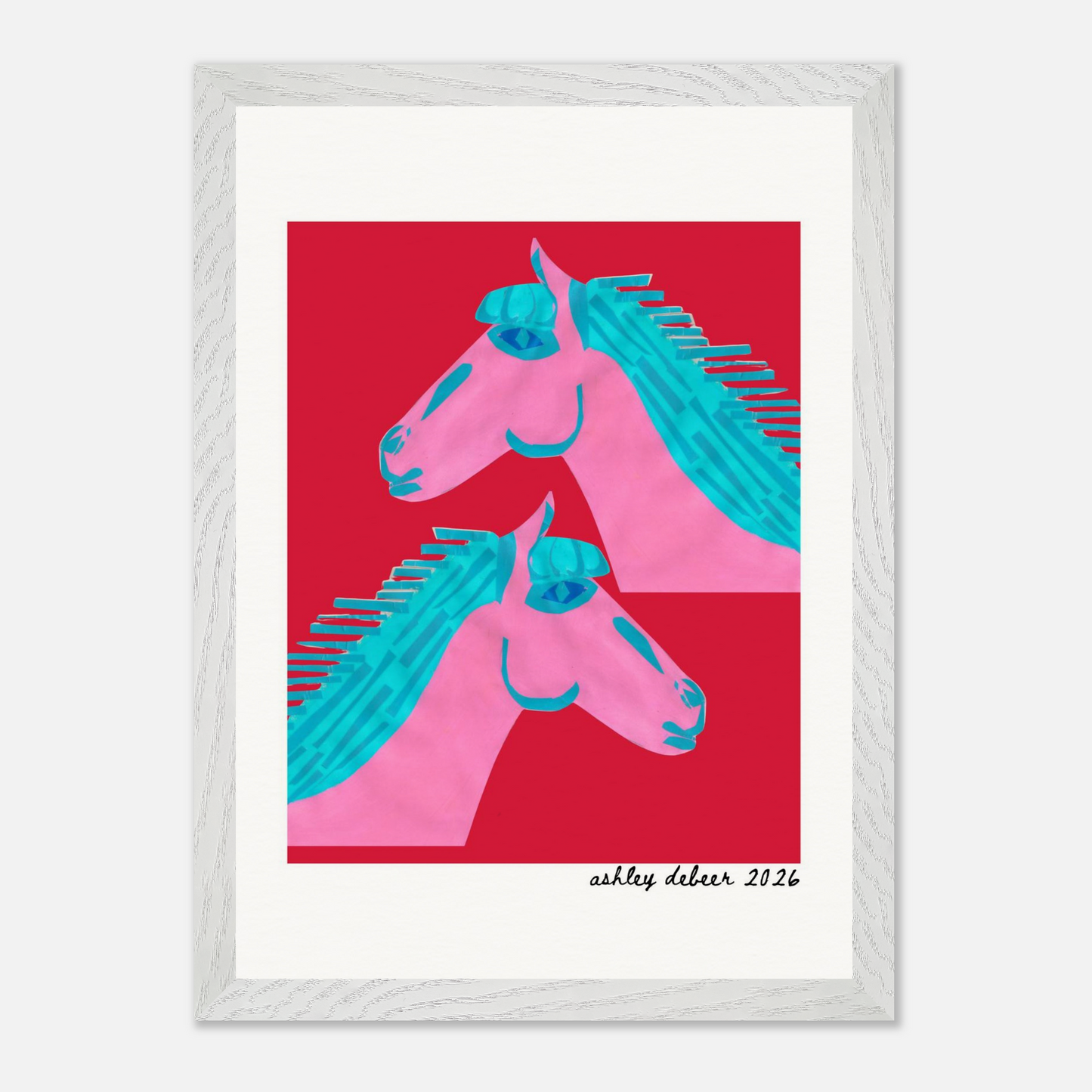 Framed artwork of two pink horses with blue manes on a red background, signed 'Ashley Deber 2026'.